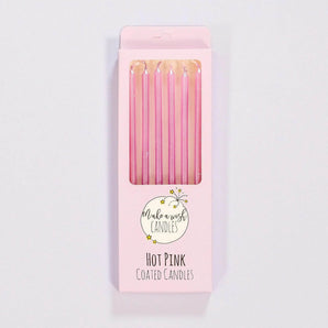 Crumbs & Doilies Hot Pink Candles in a pink box with six slender candles for cakes and cupcakes.